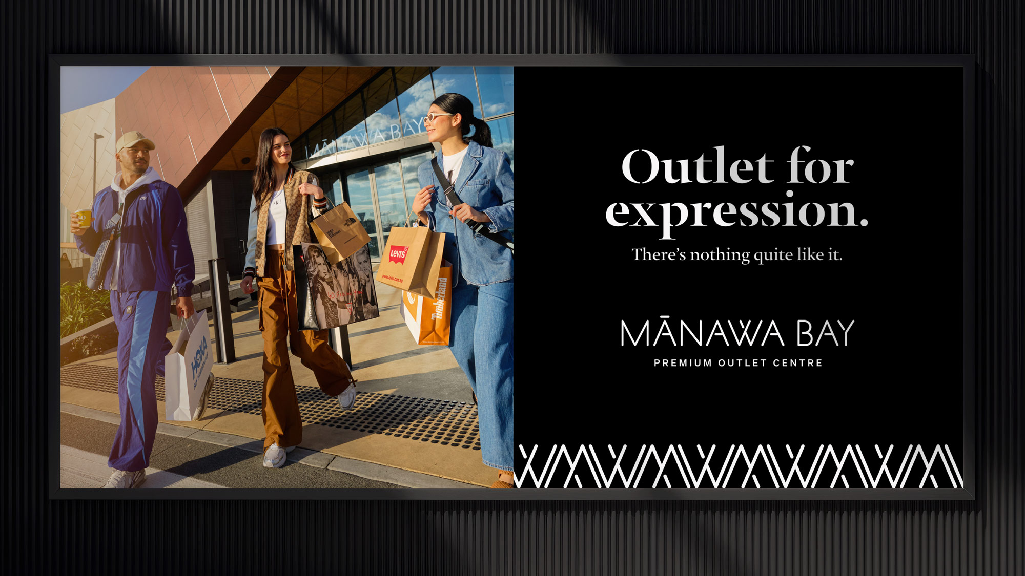 Photo of a Mānawa Bay billboard featuring brand campaign assets created by Difference